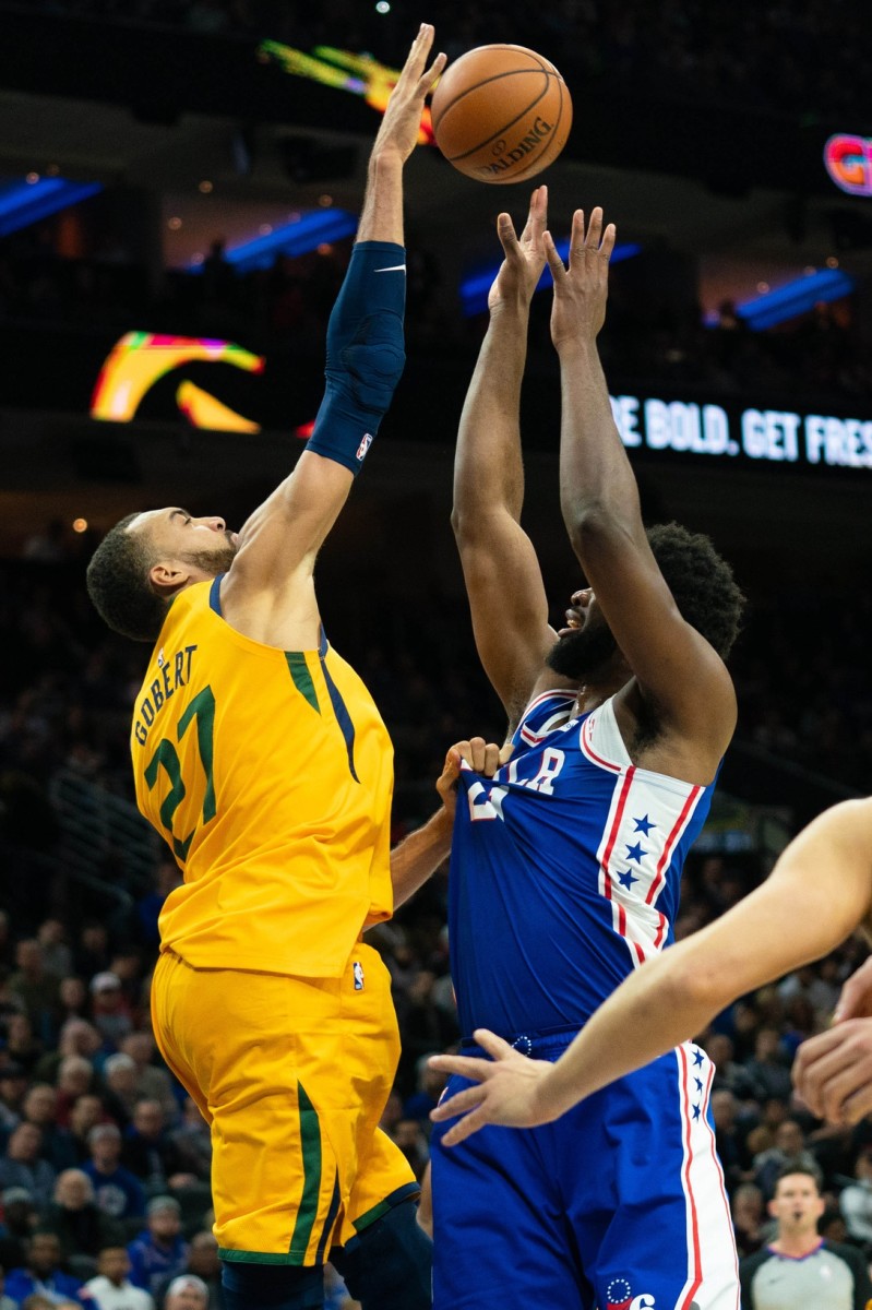 Rudy Gobert (27) blocks a shot by Joel Embiid (21)